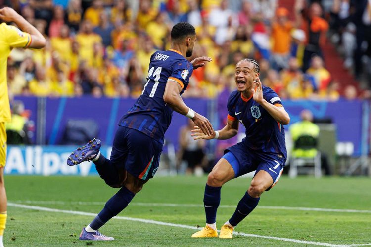 Cody Gakpo  seen celebrating after scoring goal with Xavi Simons during UEFA Euro 2024 Round of 16  game between national teams of Romania and Netherlands at Allianz Arena, Munich, Germany (Maciej Rogowski)